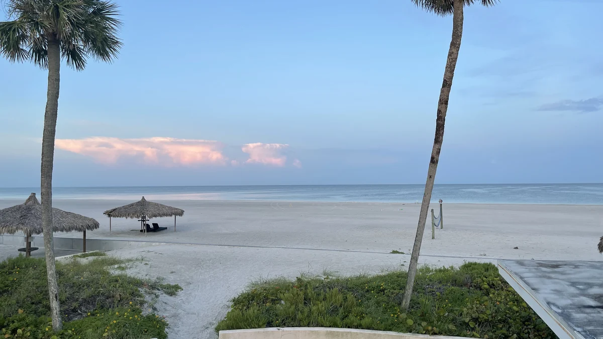 Pale sand and shoreline at Siesta Beach in Florida
