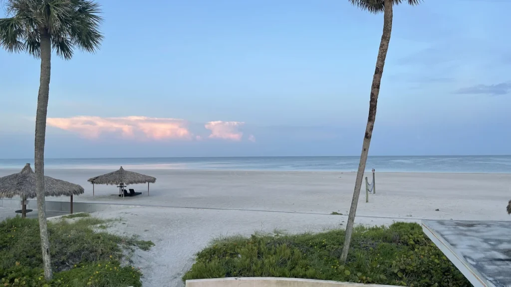 Pale sand and shoreline at Siesta Beach in Florida