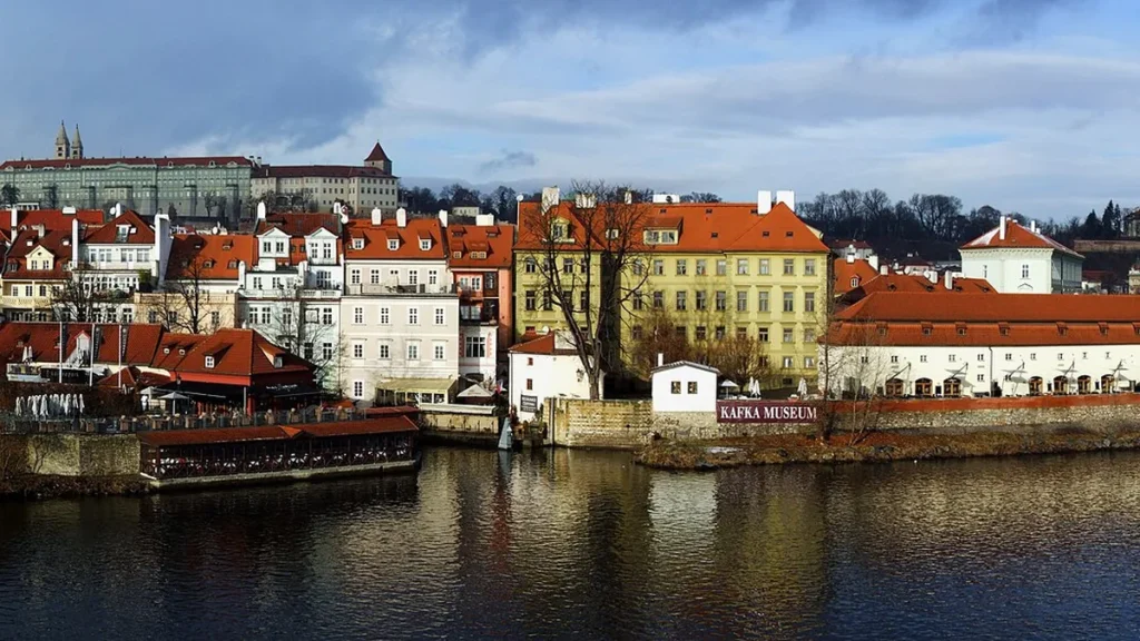 Prague rooftops and the Vltava River viewed from Charles Bridge