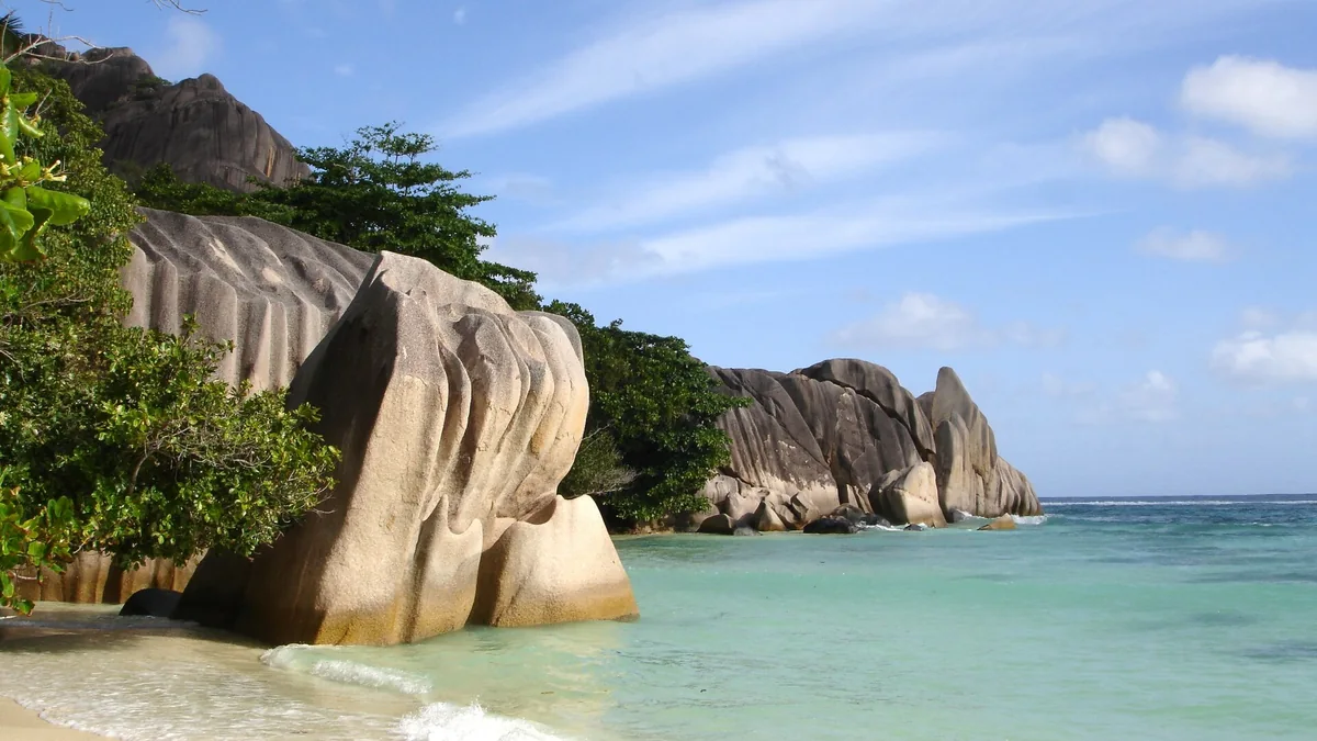 Granite boulders and turquoise water at Anse Source d’Argent on La Digue, Seychelles