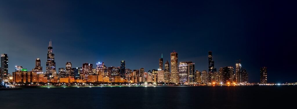 Chicago skyline at sunrise beside Lake Michigan