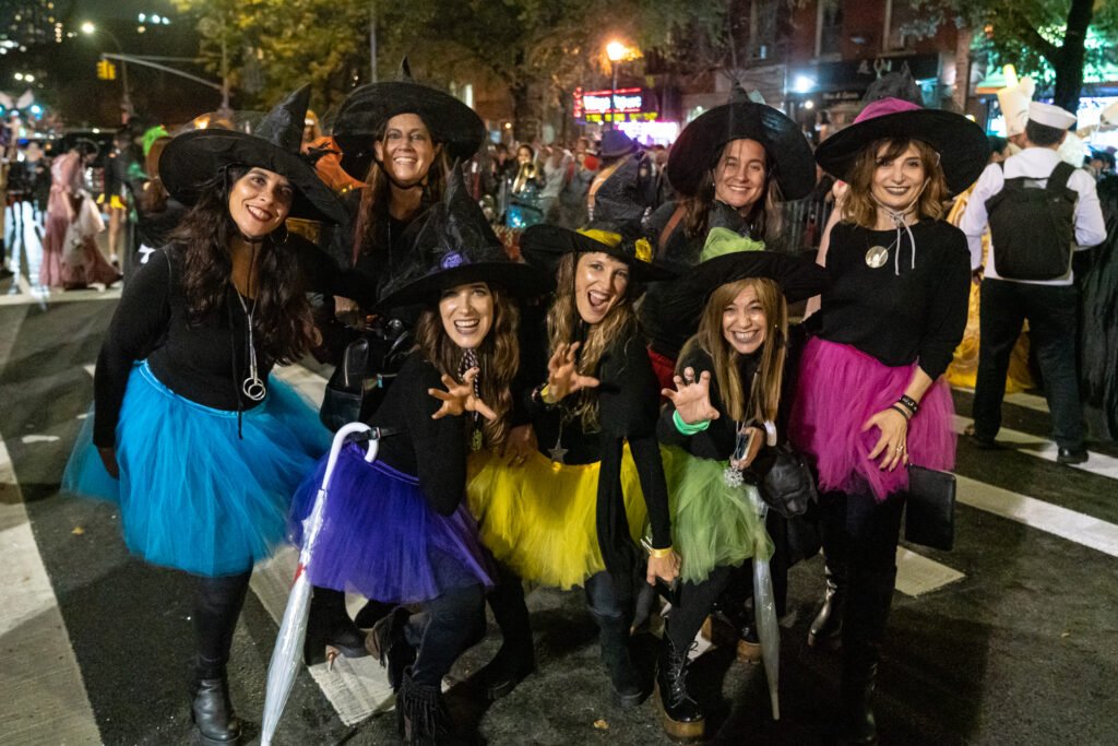 Costumed participants at New York City Village Halloween Parade at night