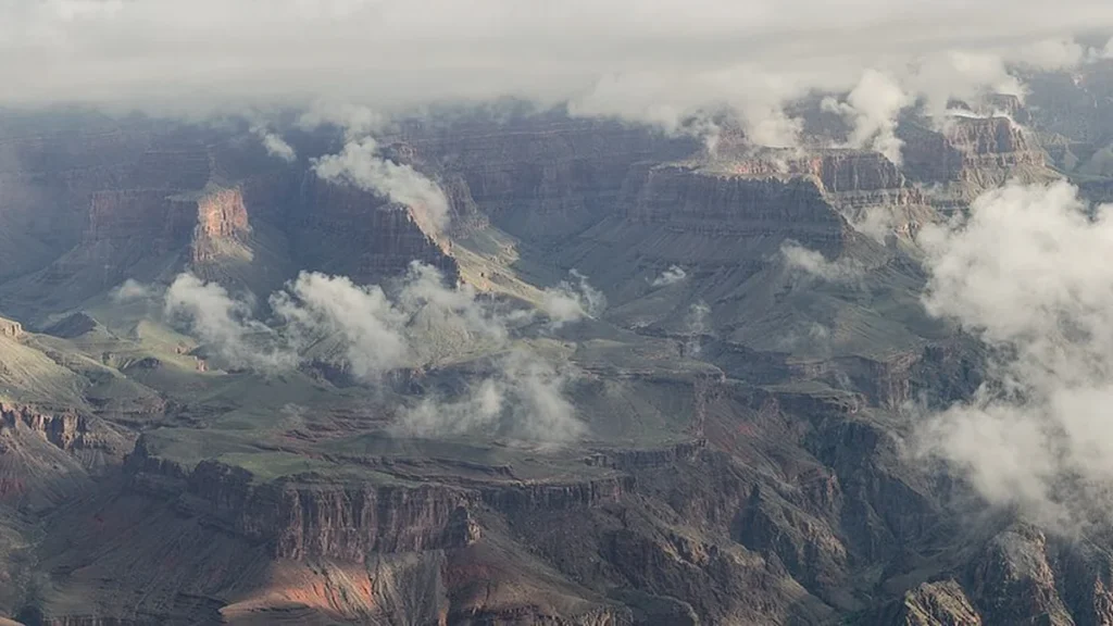 Clouds drifting over Grand Canyon rock formations seen from Mather Point on the South Rim