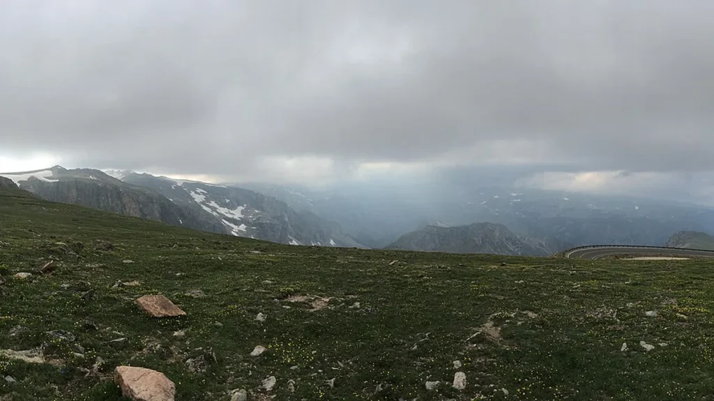 Beartooth Highway crossing alpine country beneath low clouds